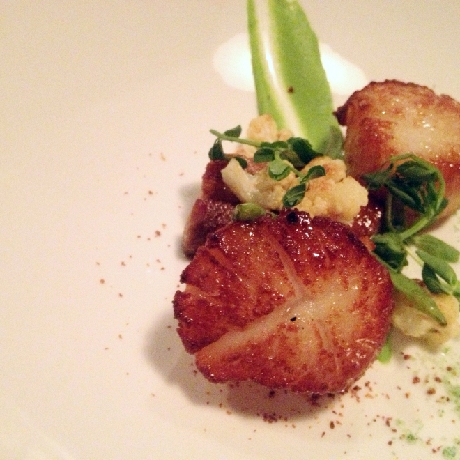 The Pan-seared scallops, green pea puree and wasabi dust appetizer at Big Louis' was delectable- Photo: Kim Gradek